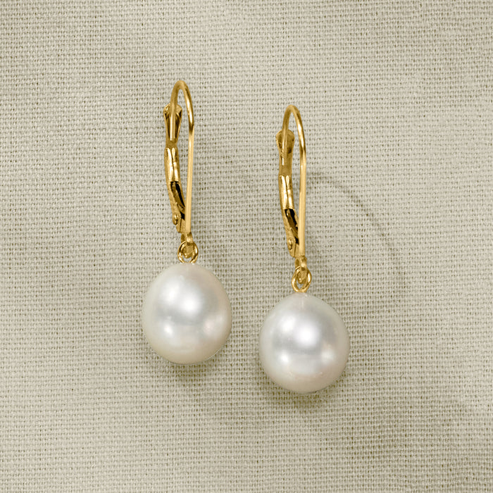 Cultured pearl drop earrings in 14kt yellow gold with leverback hooks, close-up