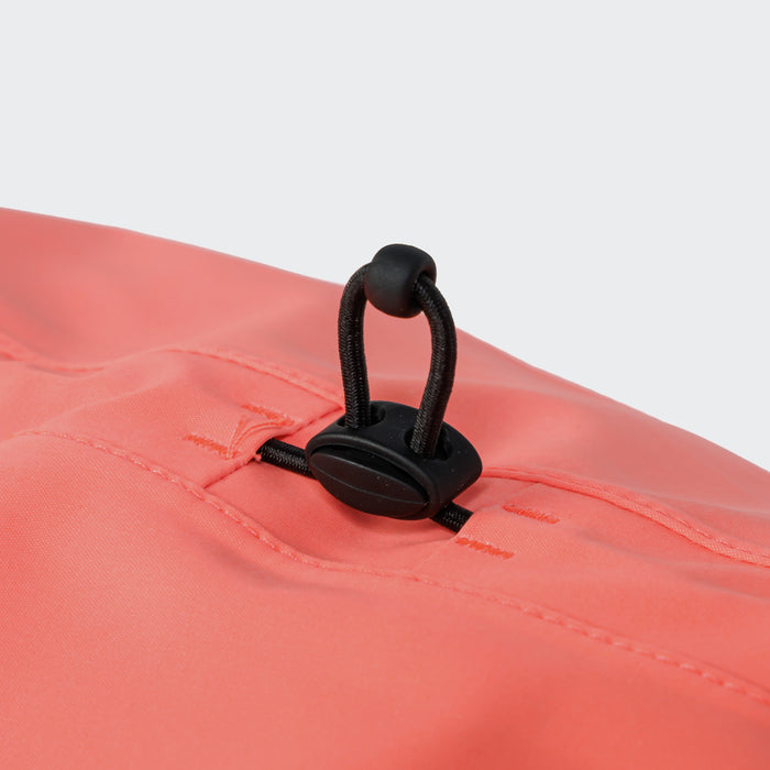 Cloud7 AKTIV reflective dog raincoat in high-visibility color, showcasing the extended shape and relaxed cut for full body coverage on a dog.