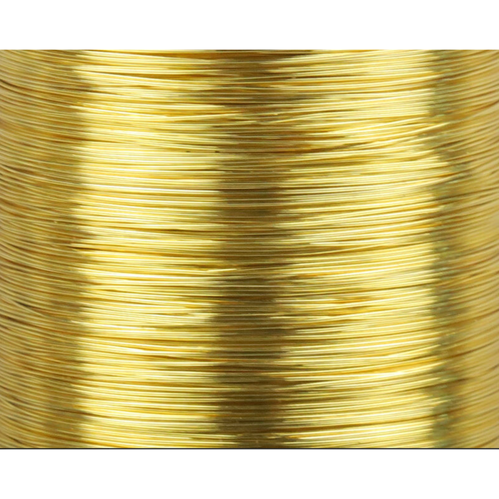 Macro detail of bright neon yellow wire strands with glossy finish