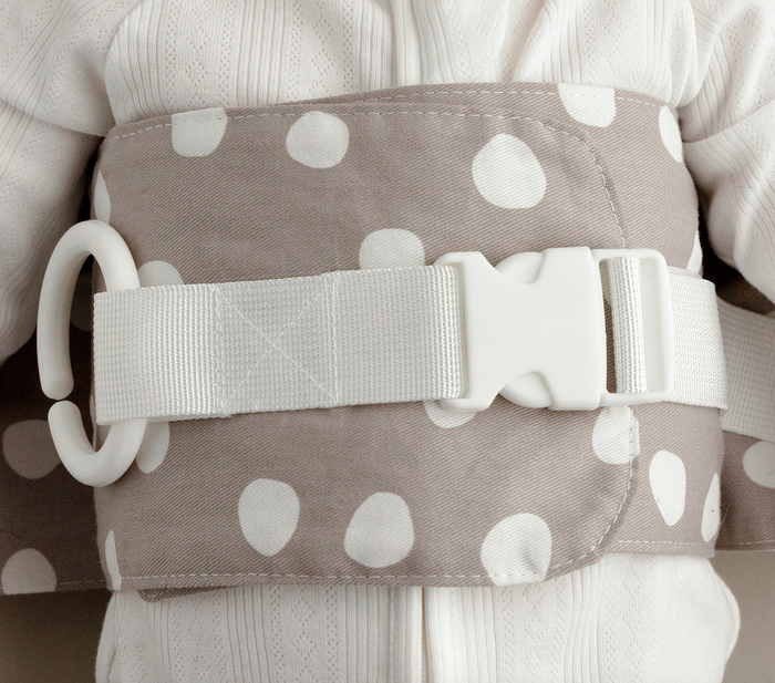 Close-up of the the Spotty Dotty WriggleBum nappy change harness.